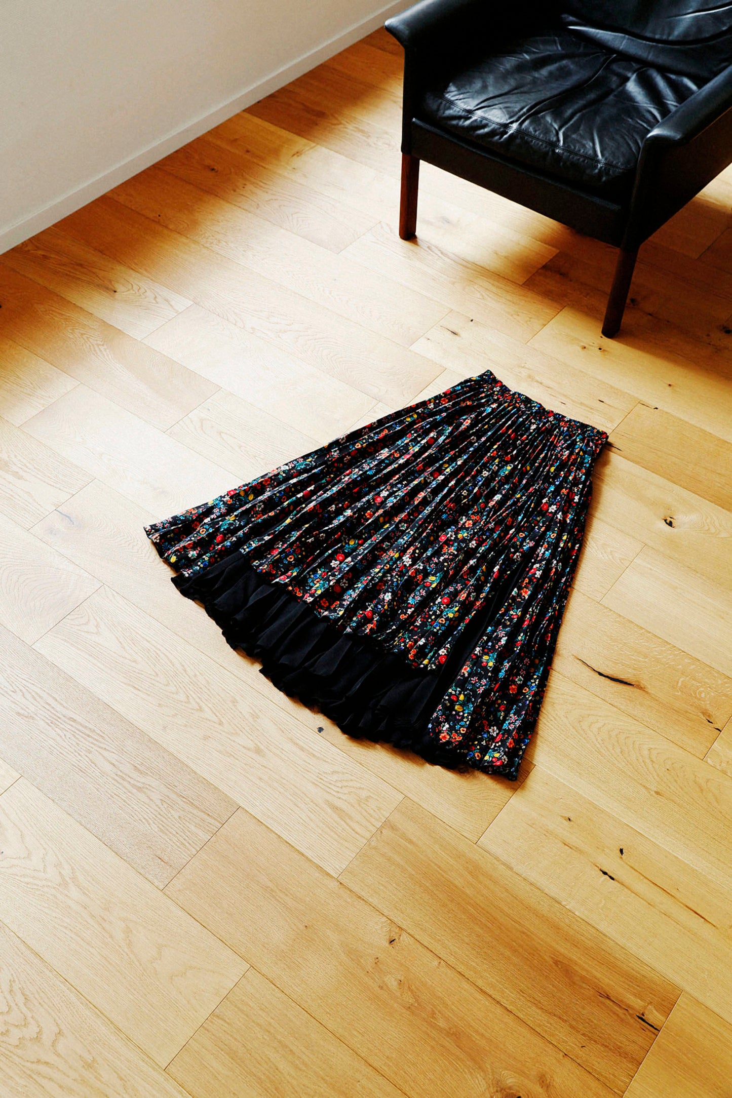 TWO PLEATED SKIRTS