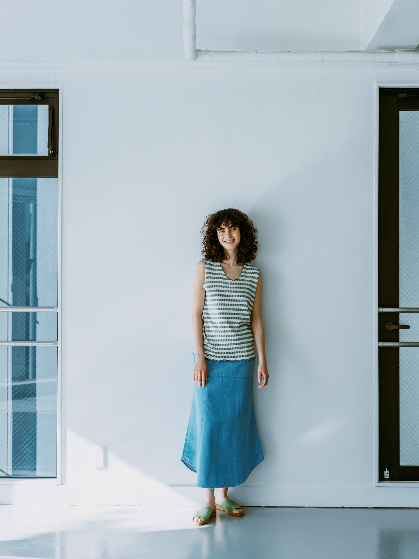 BORDER SLEEVELESS