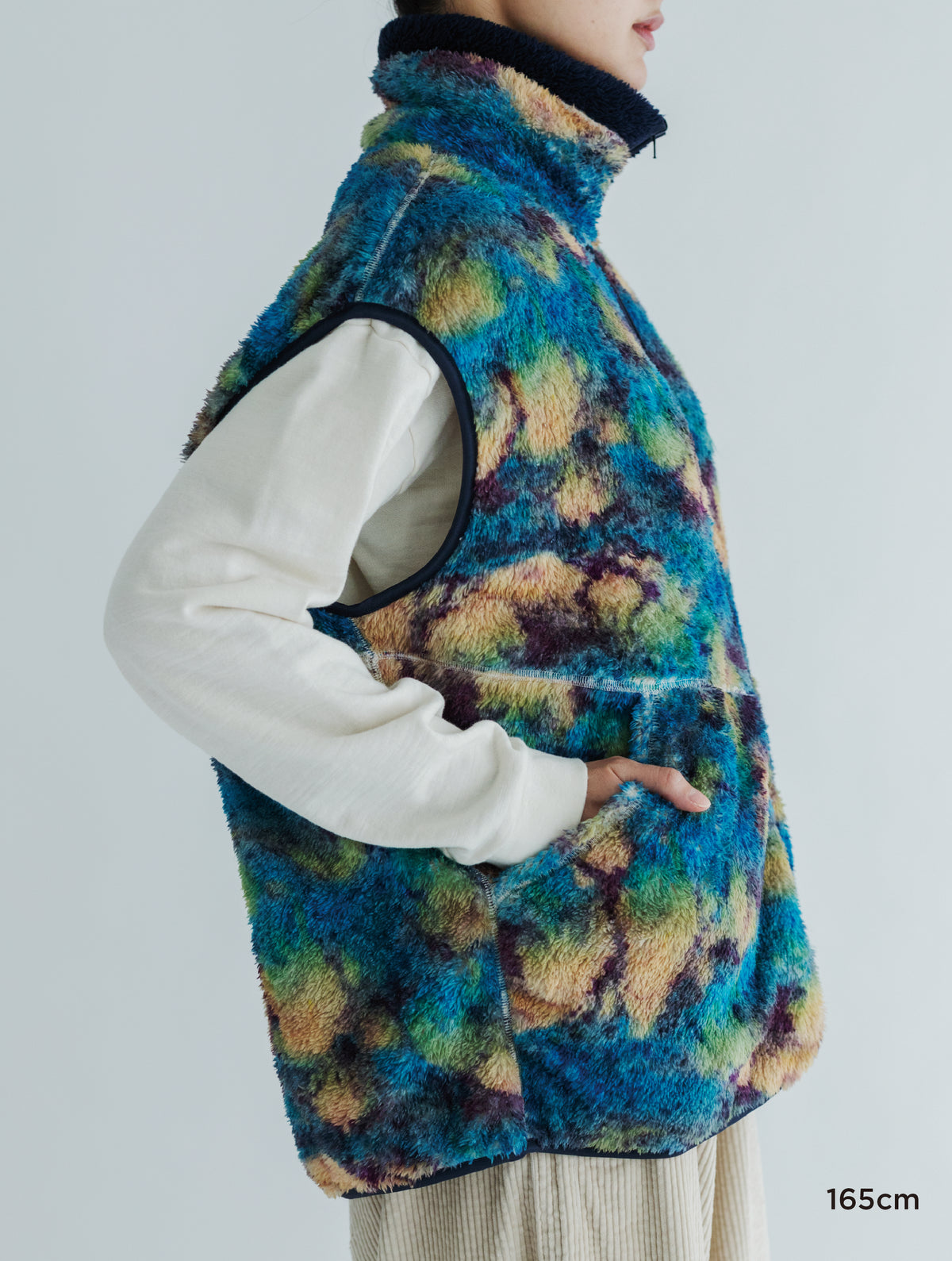 PRINT/ SOLID REVERSIBLE FLEECE VEST
