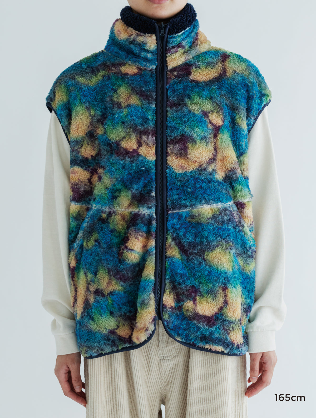PRINT/ SOLID REVERSIBLE FLEECE VEST