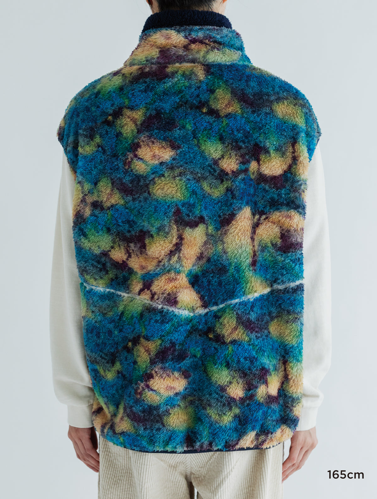 PRINT/ SOLID REVERSIBLE FLEECE VEST