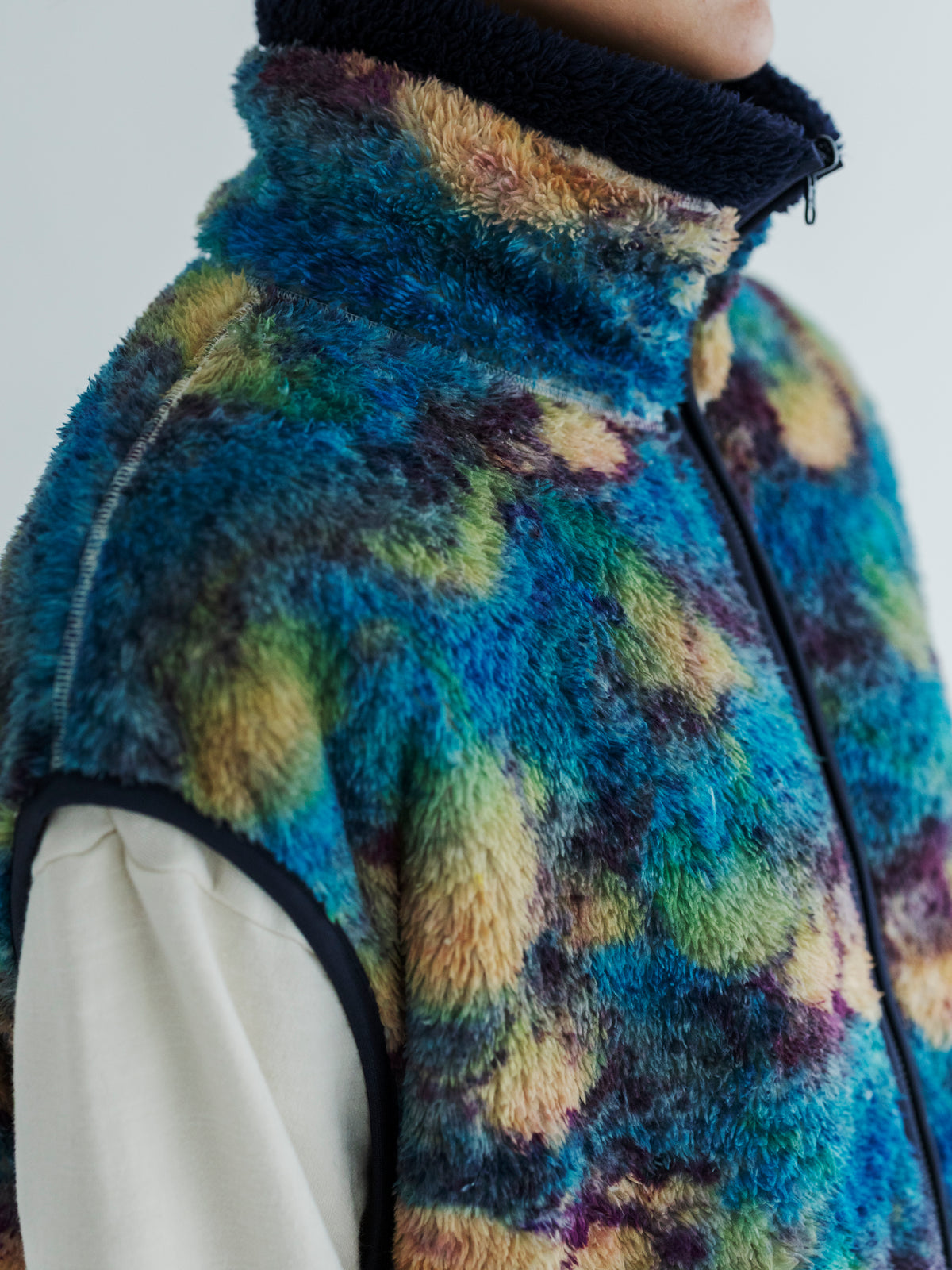 PRINT/ SOLID REVERSIBLE FLEECE VEST