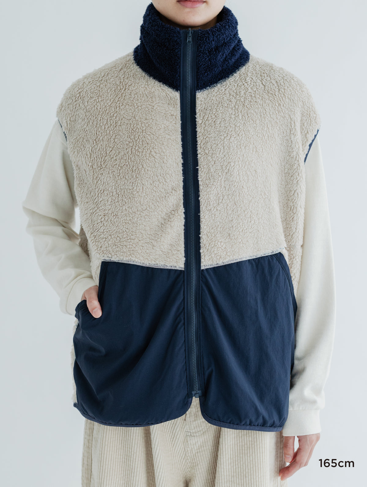 PRINT/ SOLID REVERSIBLE FLEECE VEST