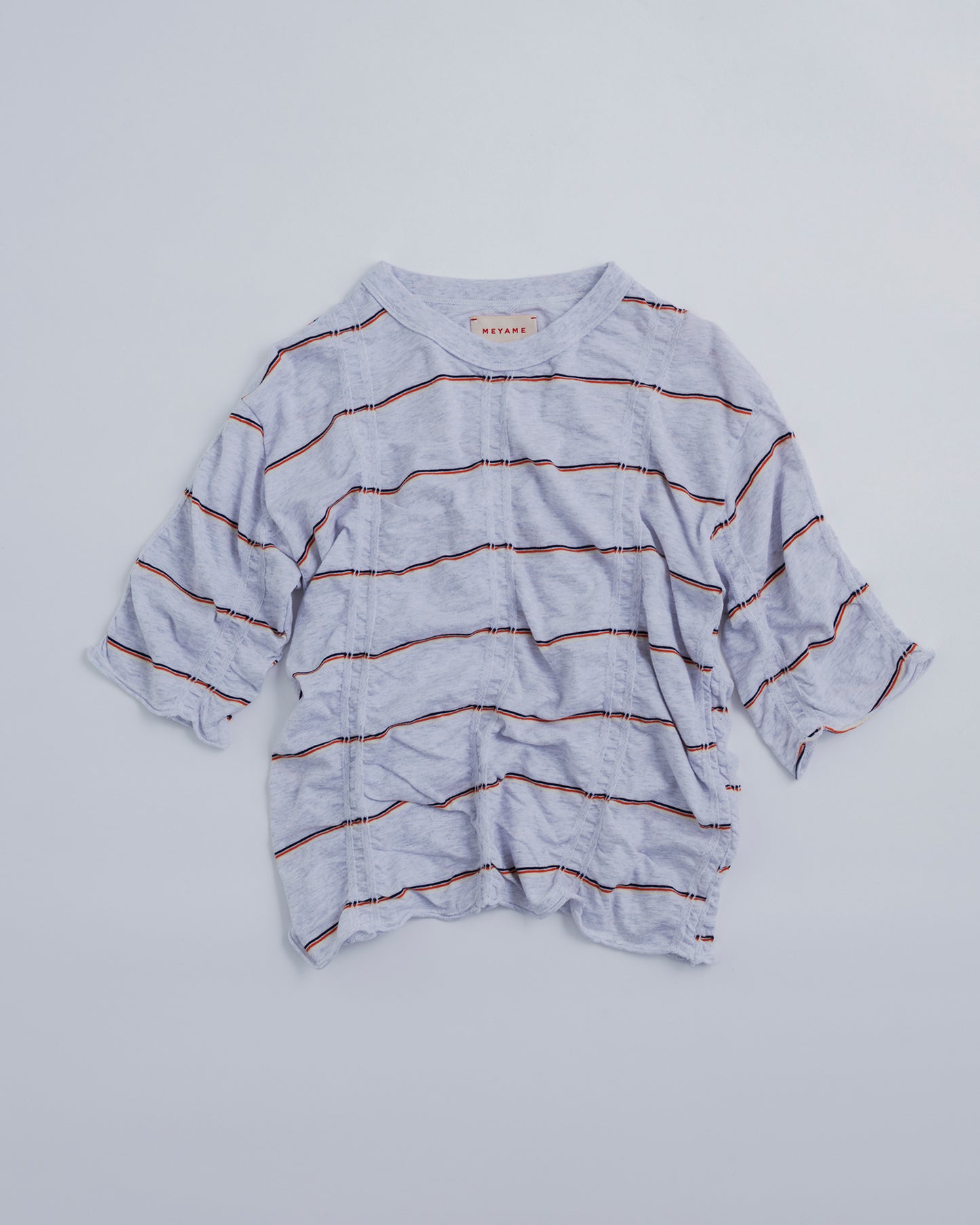 TUCKED JACQUARD BORDER HALF SLEEVE