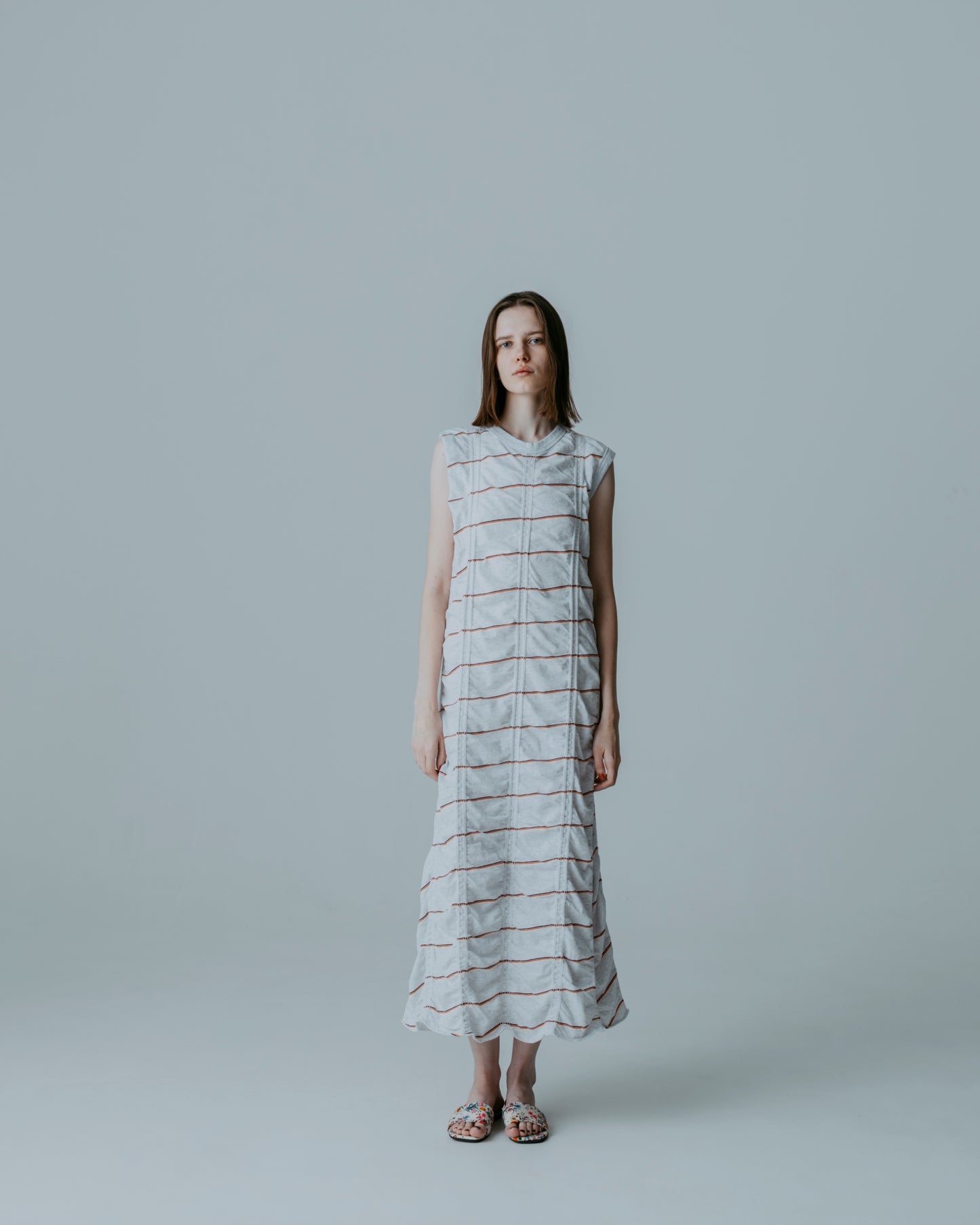 TUCKED JACQUARD BORDER SLEEVELESS DRESS